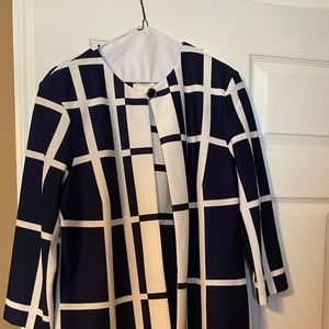 Sleeveless dress with long jacket